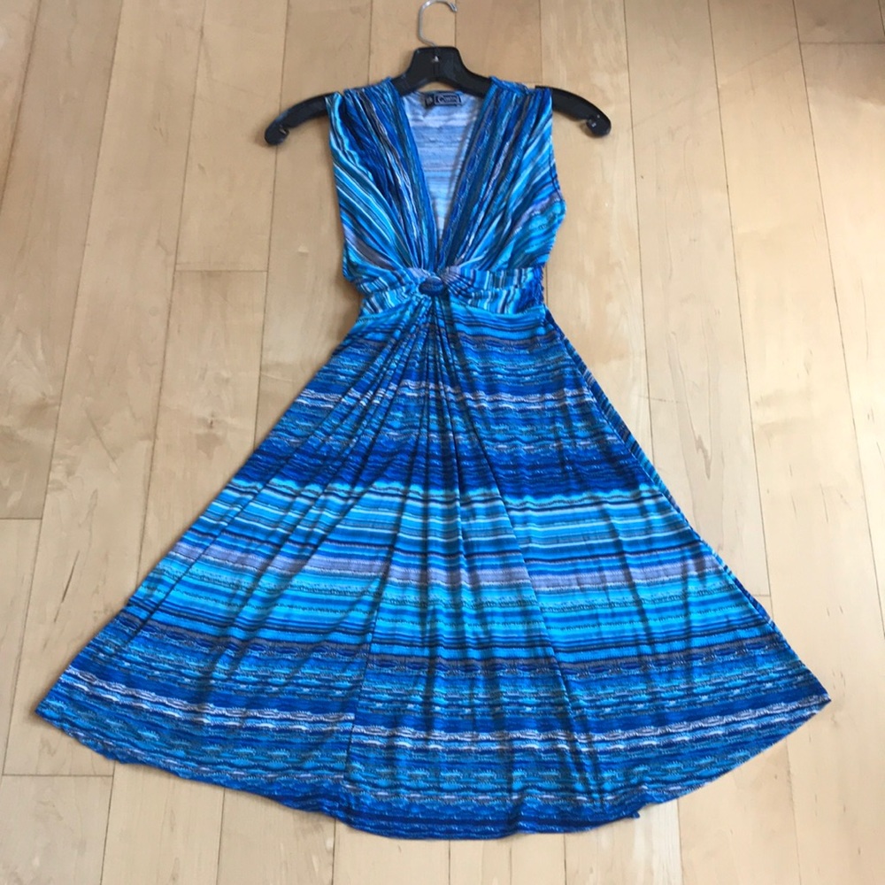 Striking blue dress with deep v neck and tie